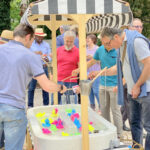 Location d'une pêche aux canards pour adultes pour une journée de cohésion à Lyon sur le thème de la fête foraine et guinguette